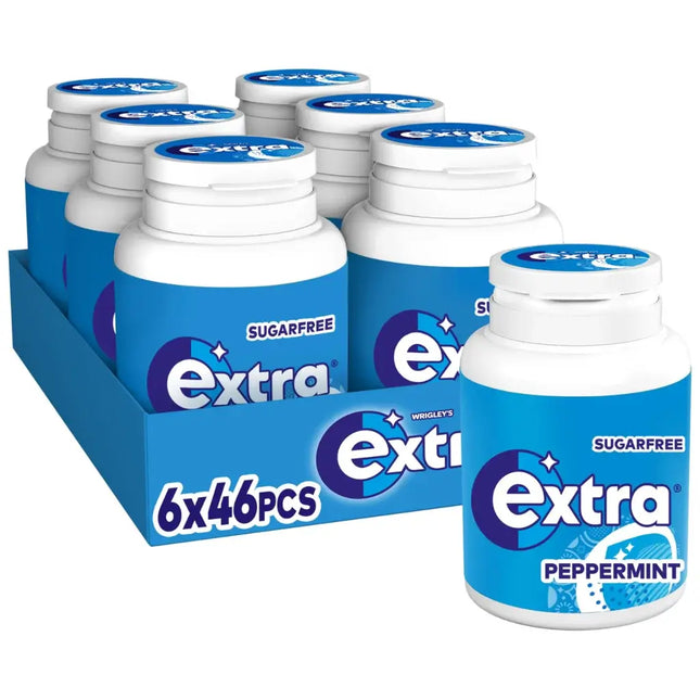 Multiple bottles of Extra sugarfree peppermint gum with packaging on a white background